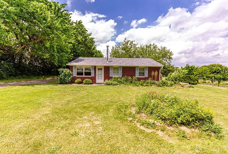 Small home on green lawn